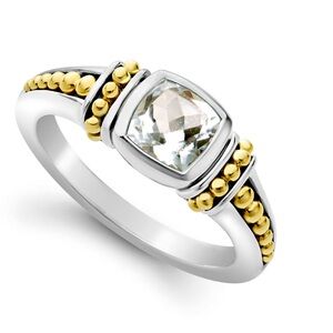 Lagos white topaz and 18k gold trim. This was a gift never worn. Size 7